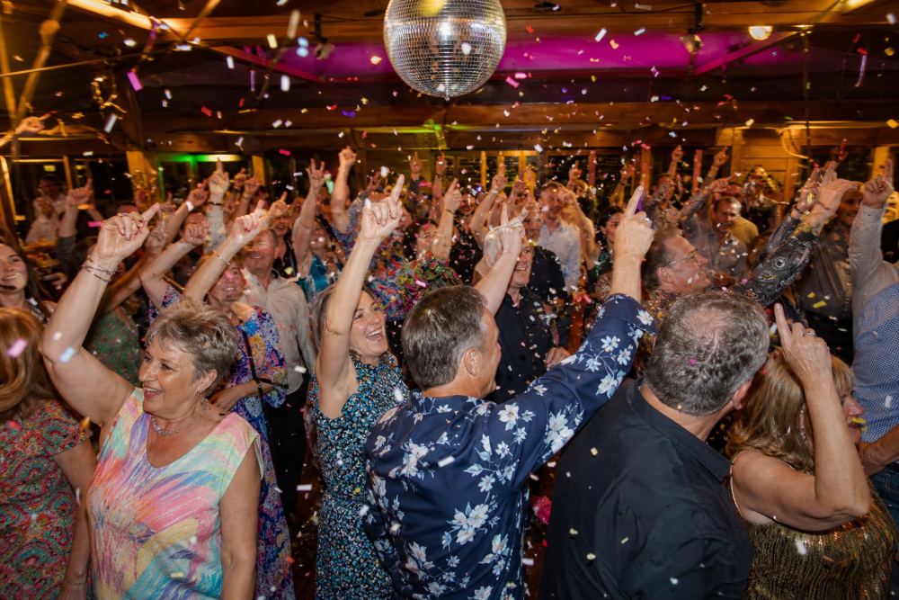 The Finale — Confetti, mirror ball, every arm in the air. It ends like this. Every. Single. Time.